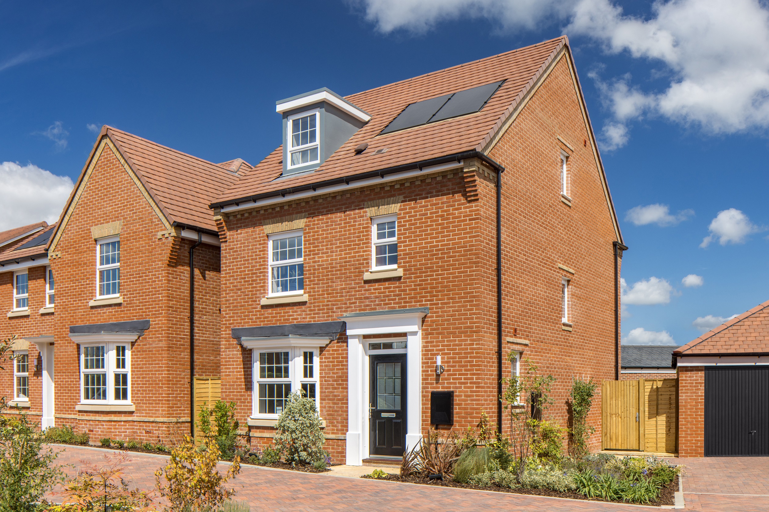 Outside of the 4 bedroom Sudbury at Brookwood Meadows July 2024