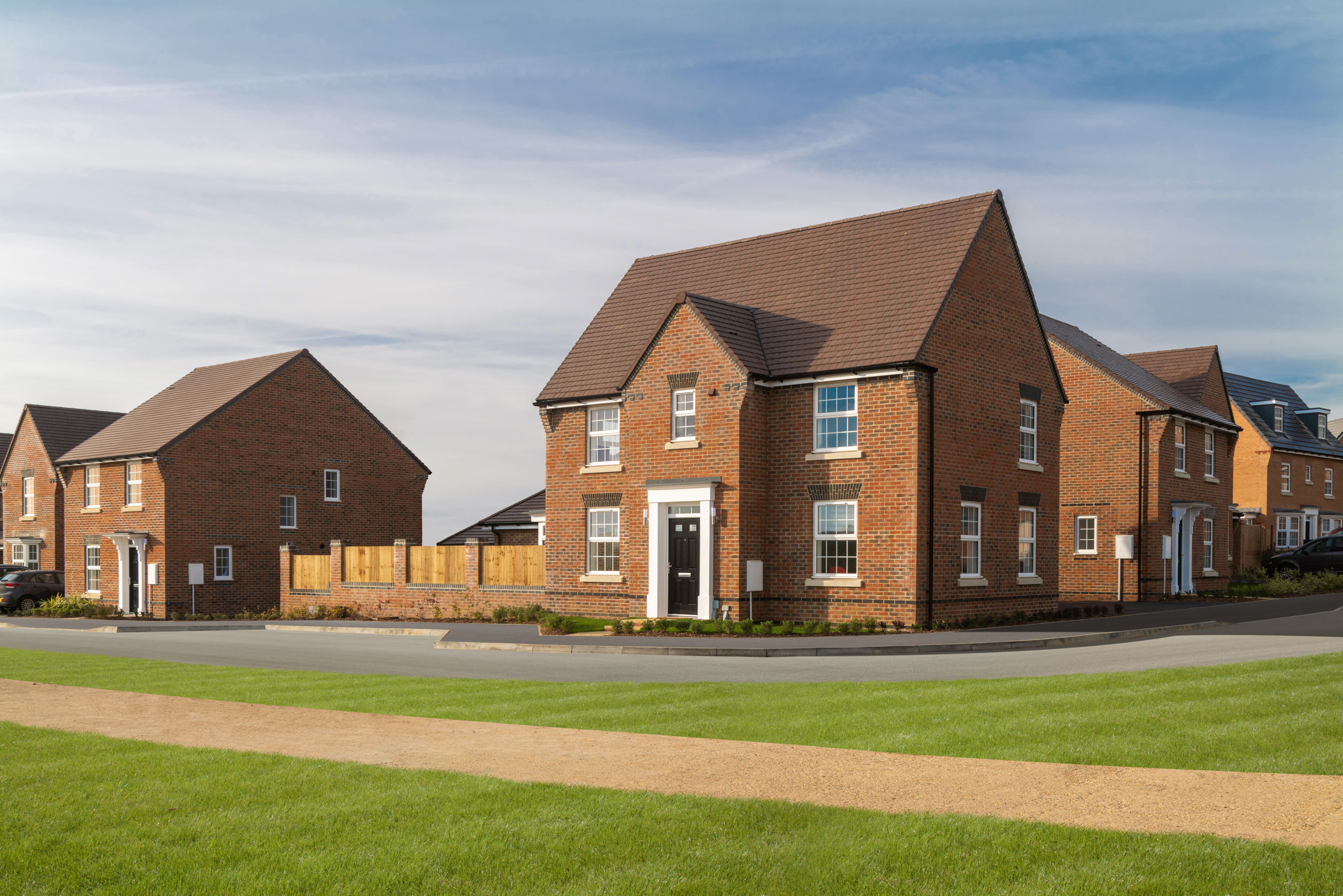 Outside view of a selection of 4 bedroom homes at Chalkers Rise