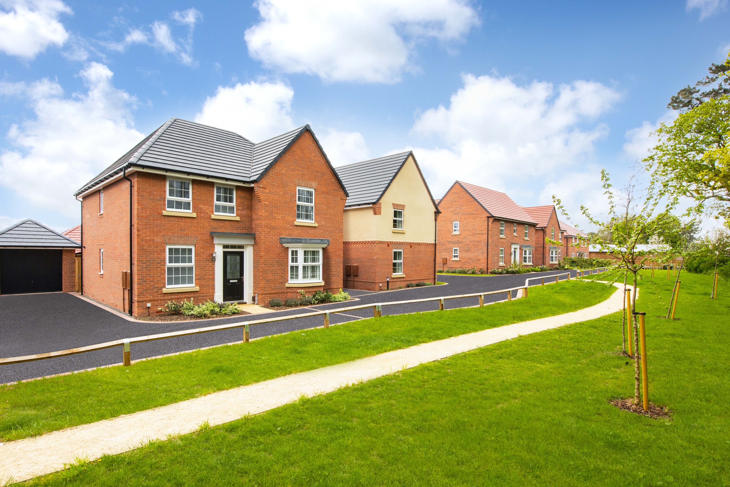 External view of four bedroom homes with render 