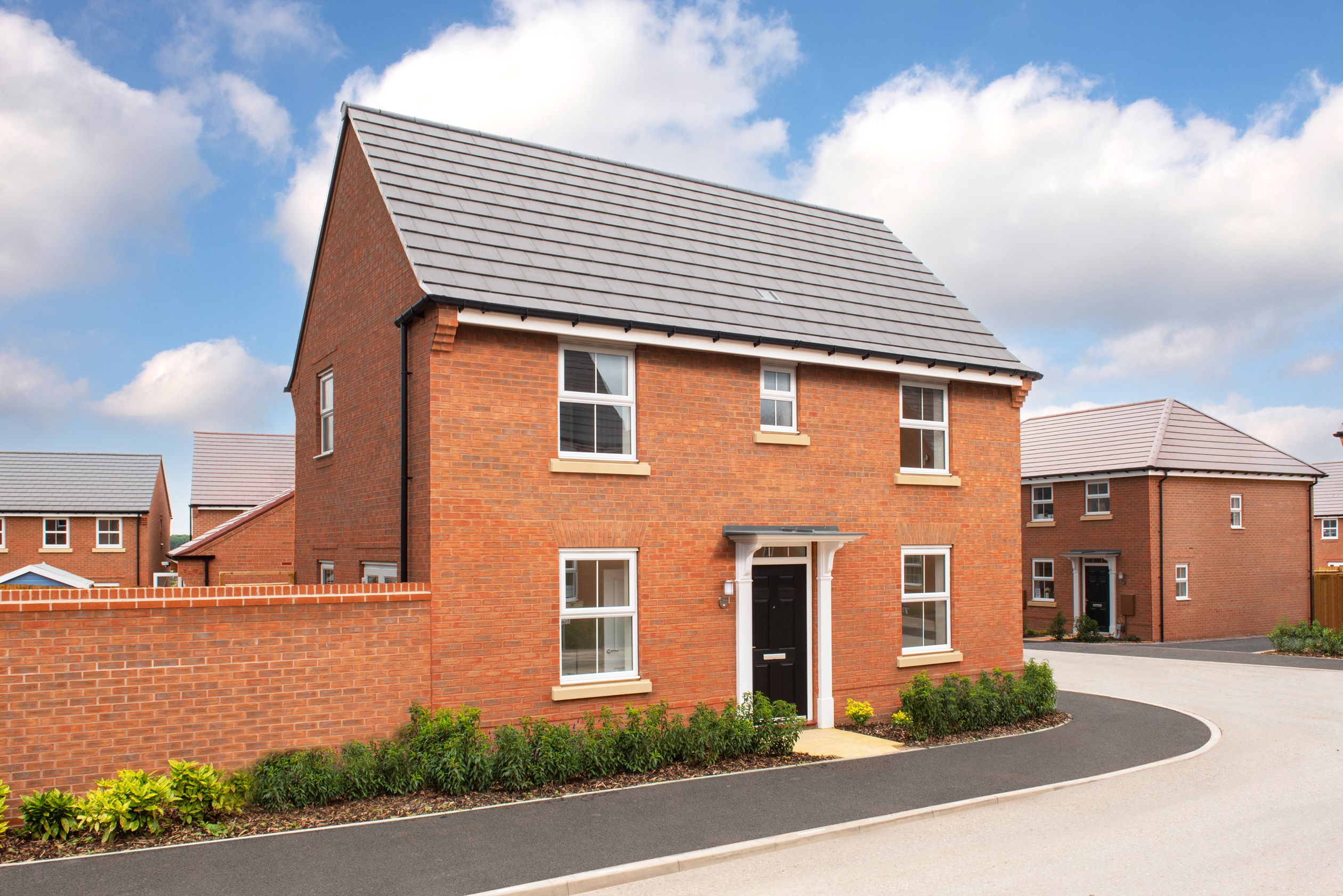 outside view of a detached 3 bedroom home with private walled garden