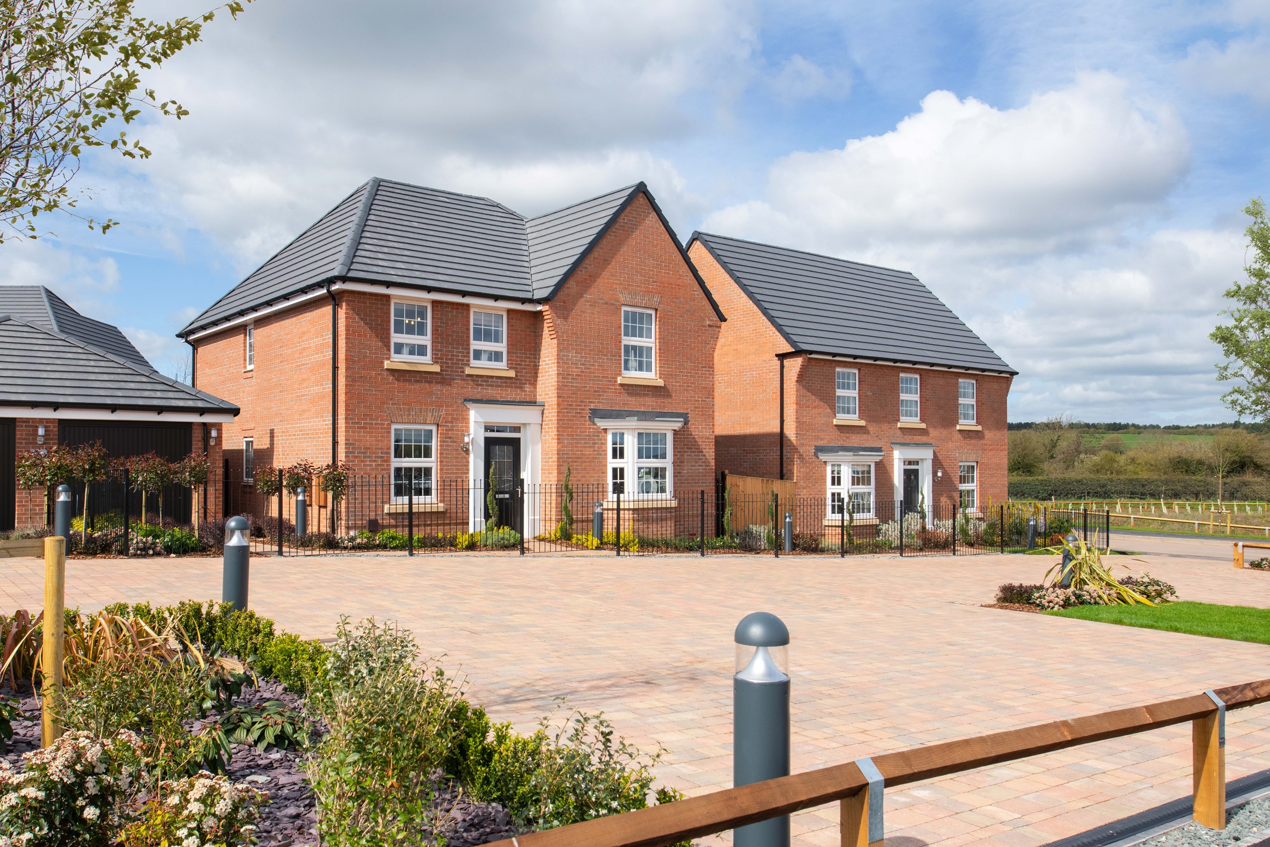External view of two detached family homes