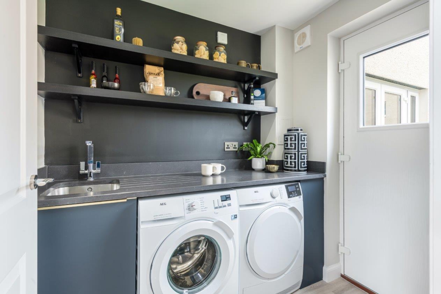 Utility room in detached 4 bedroom home