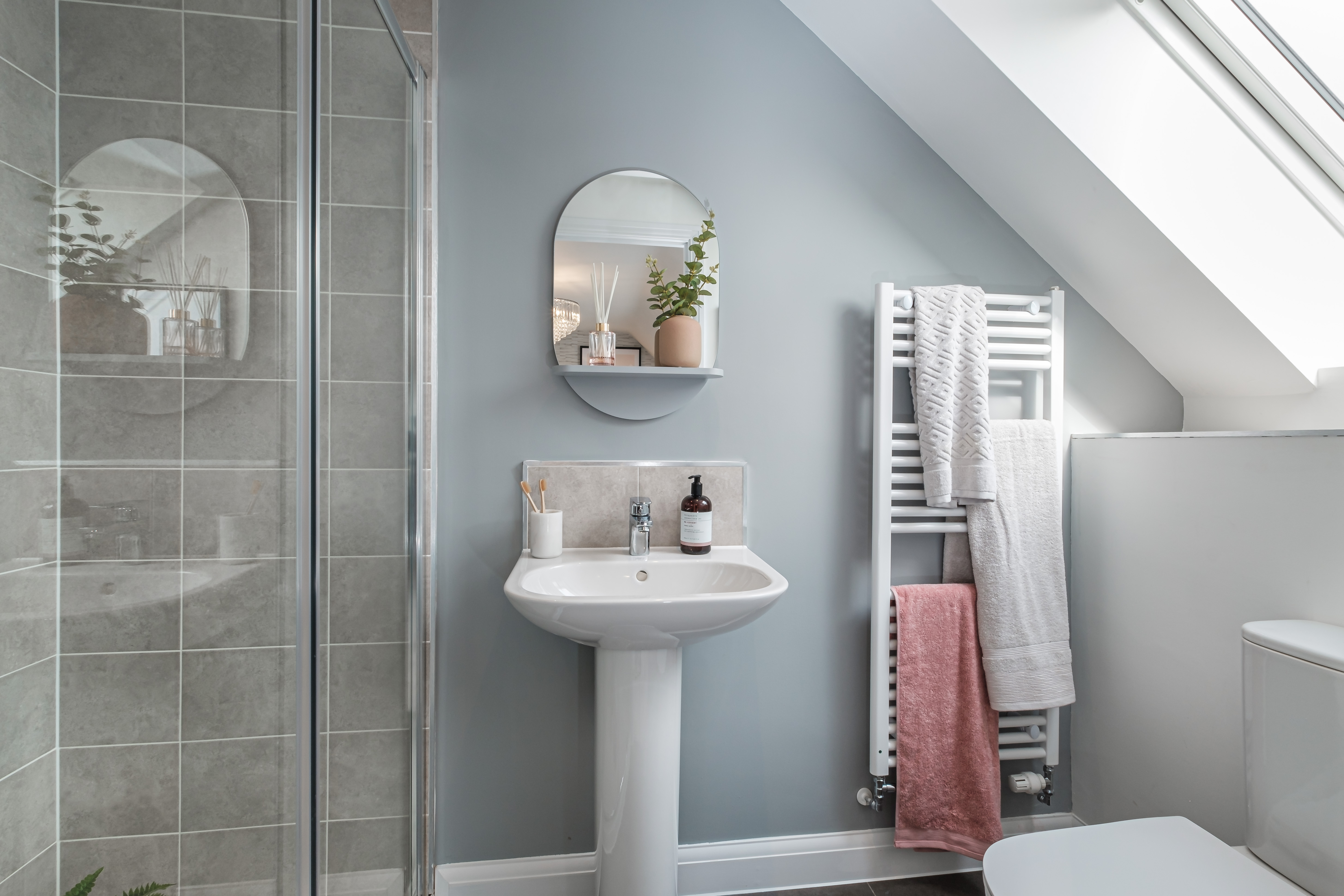 Kennett en suite shower room with slanted ceiling