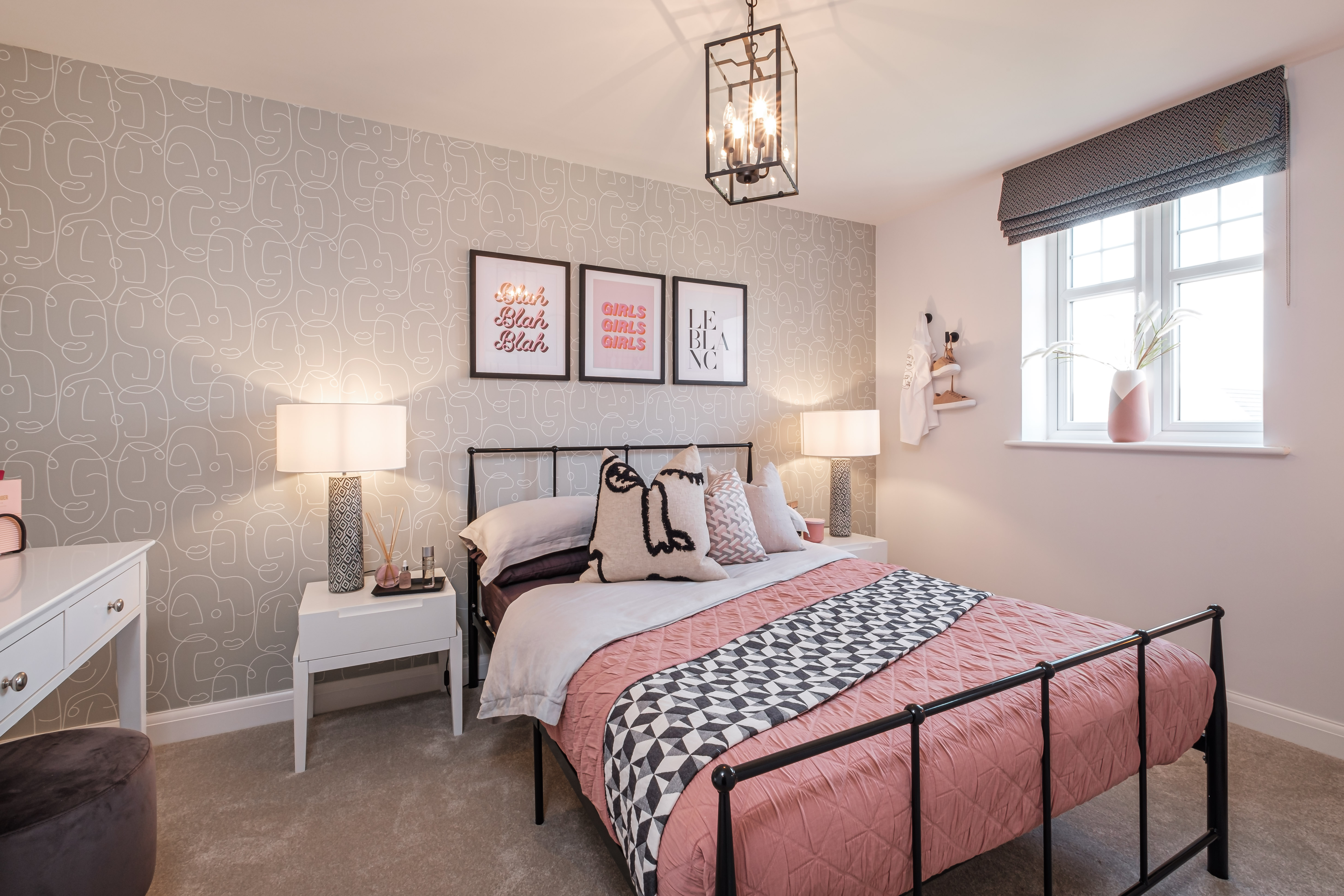 Double bedroom with a desk and large window