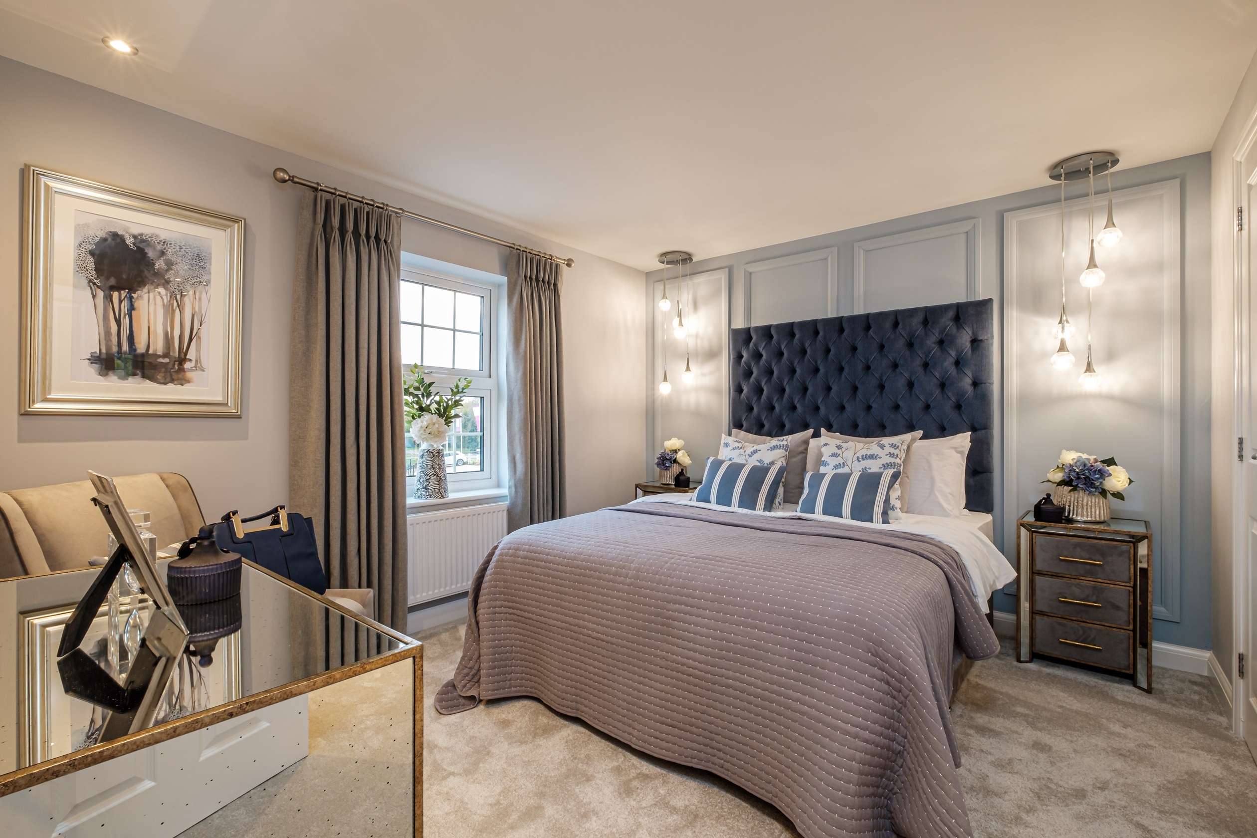 Large double bedroom with grey panelled walls