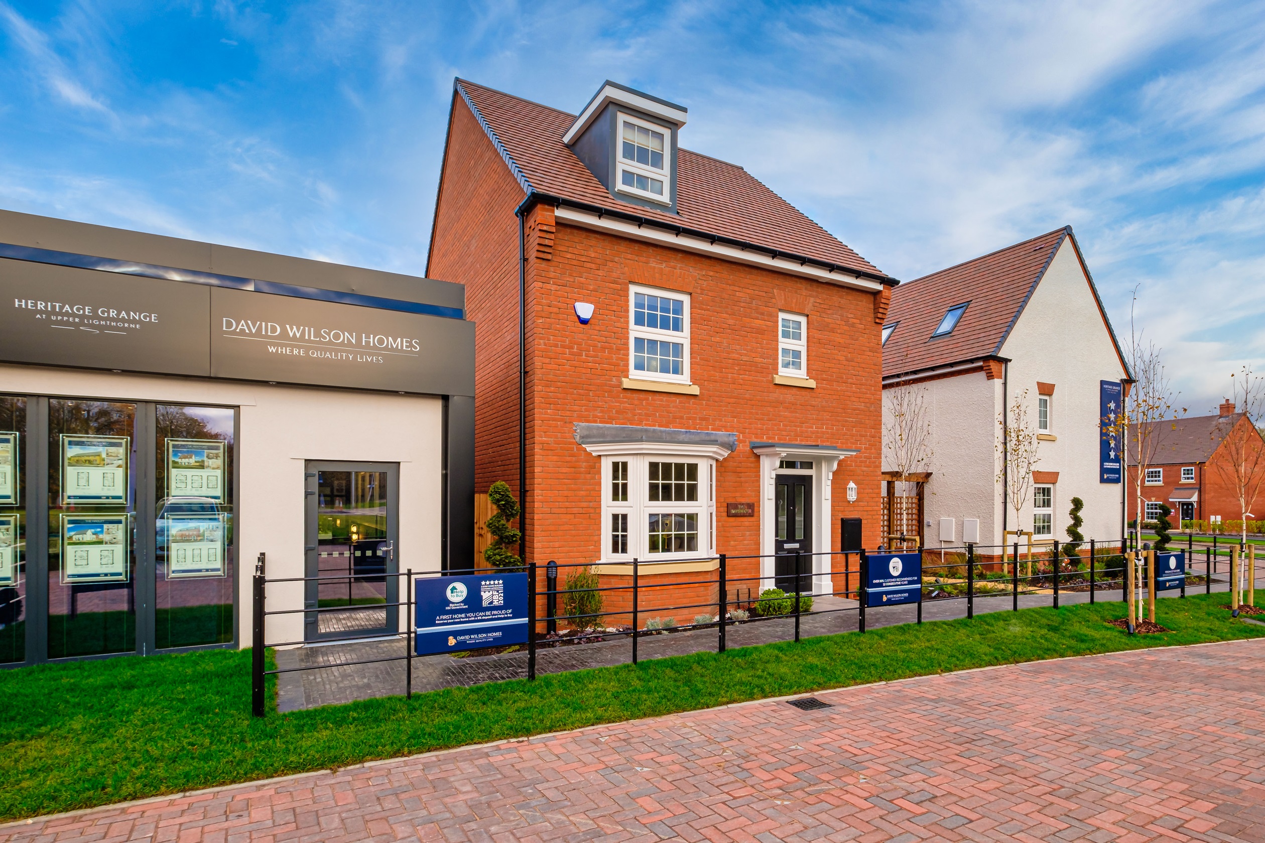 Photo of an orange brick 3-storey house