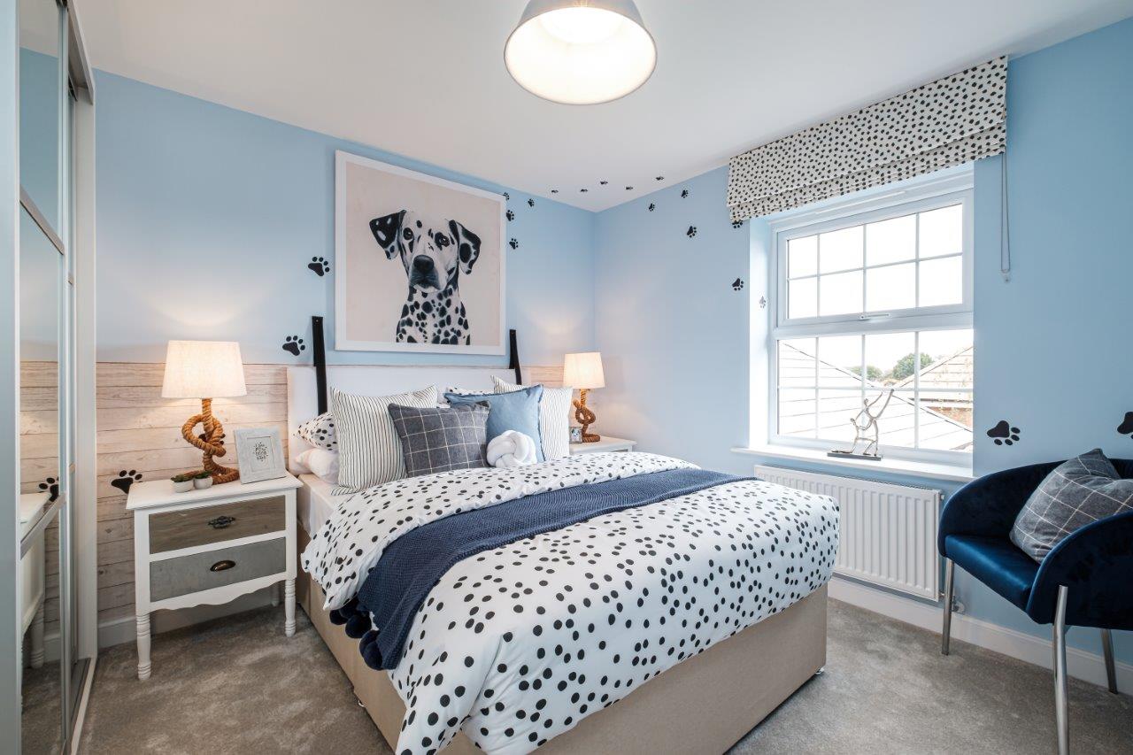 Light blue bedroom with window