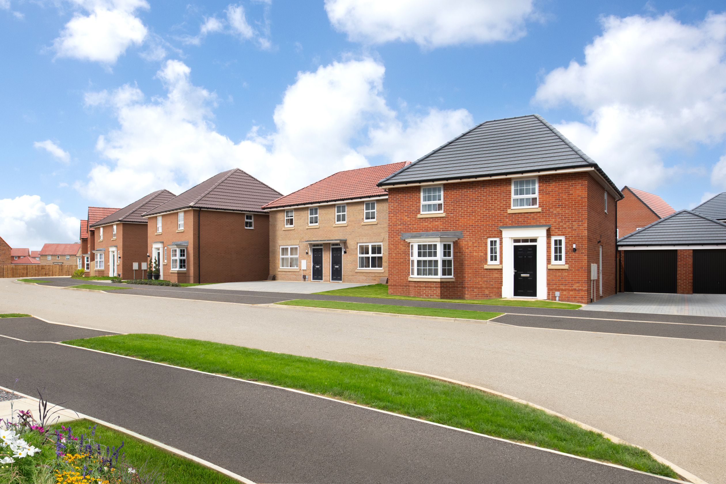 Street scene of 4 bedroom detached Kirkdale home at The Orchard at West Park