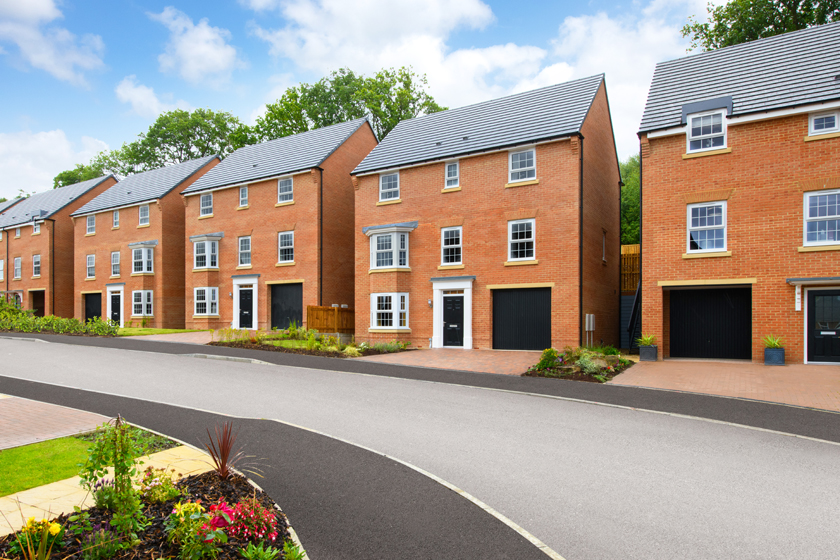 Streetscene showing 4 bed Allendale housetype with woodland backdrop