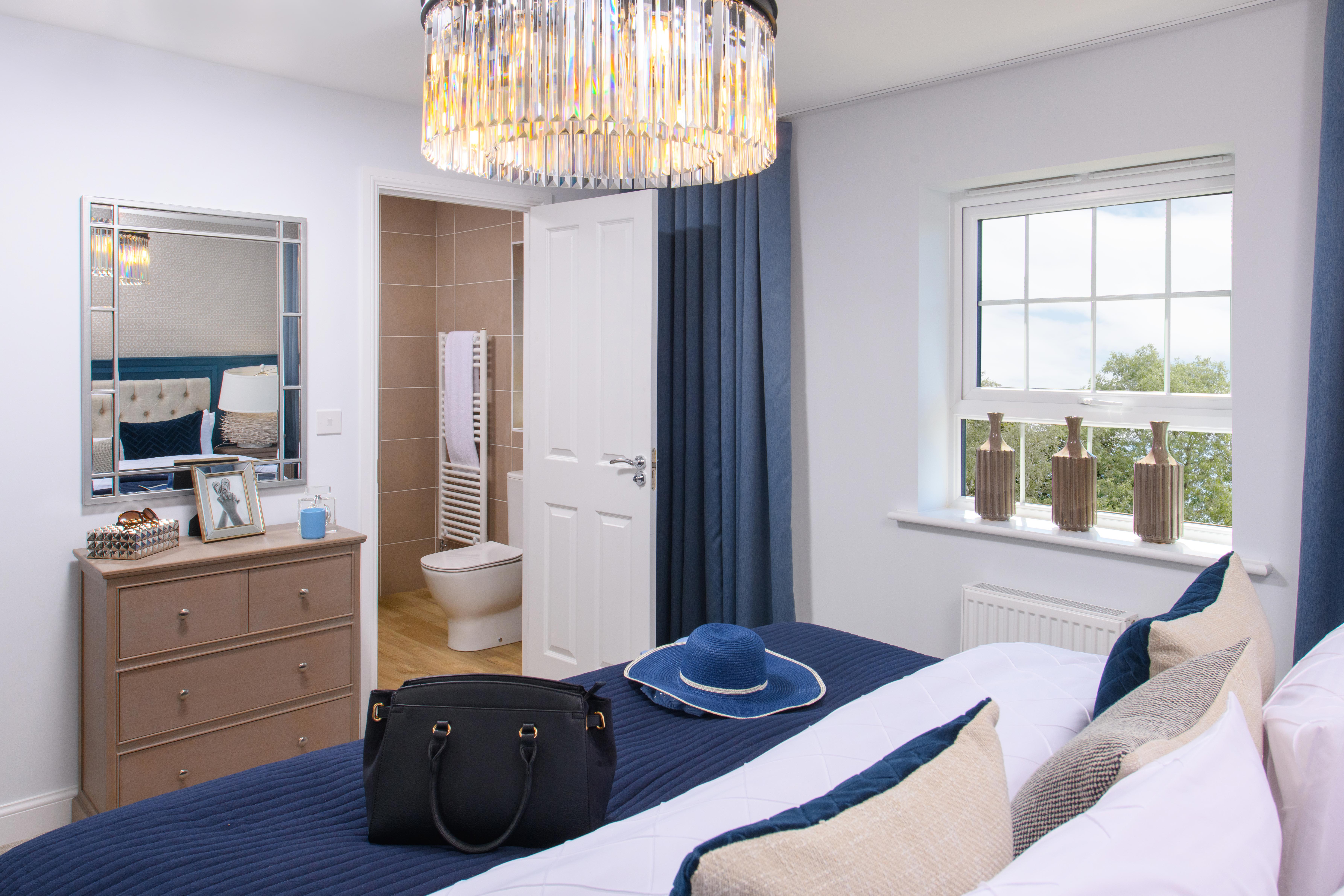 Double bedroom with en suite & built-in storage in Bradgate style home