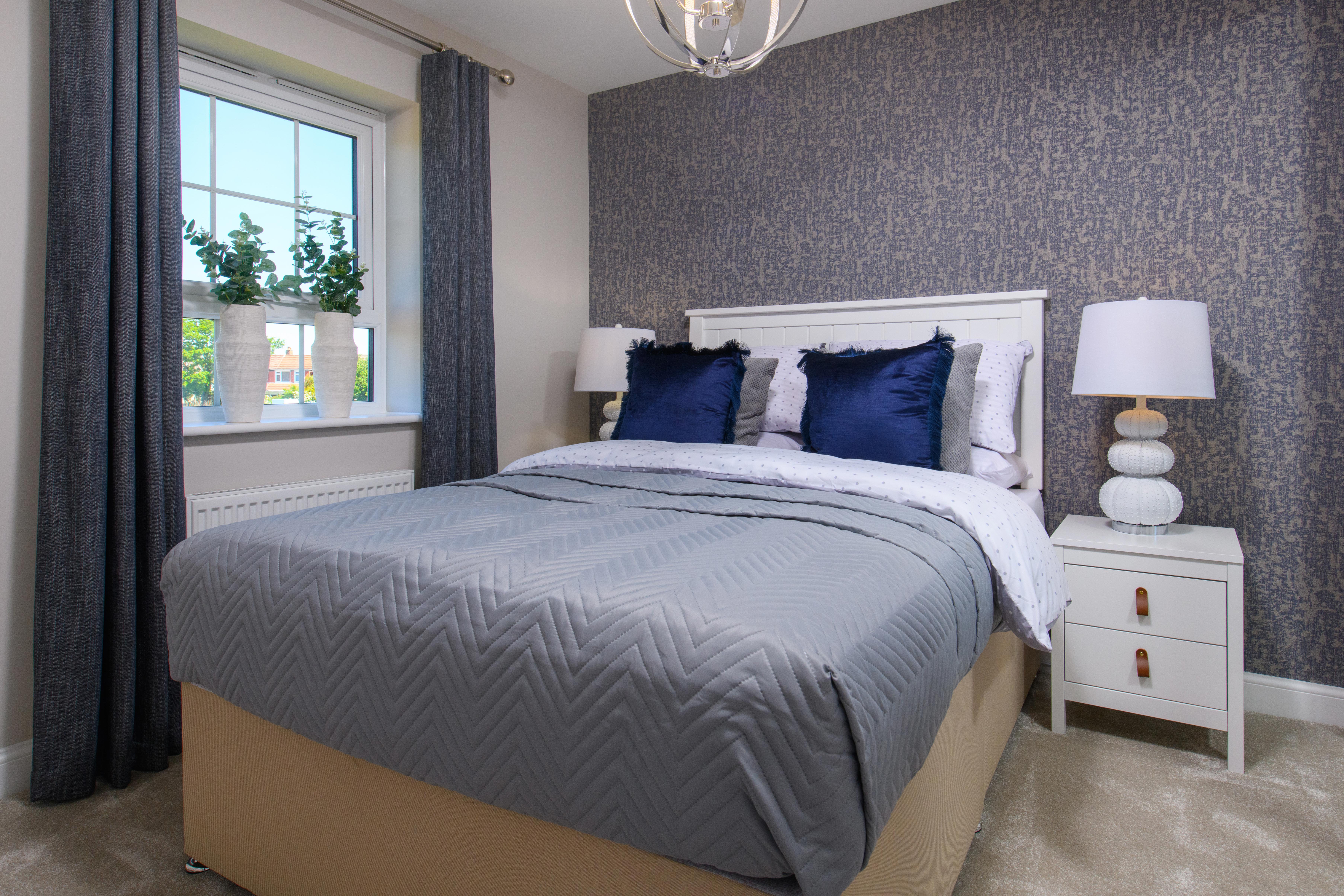 Double bedroom with built-in storage in Bradgate style home