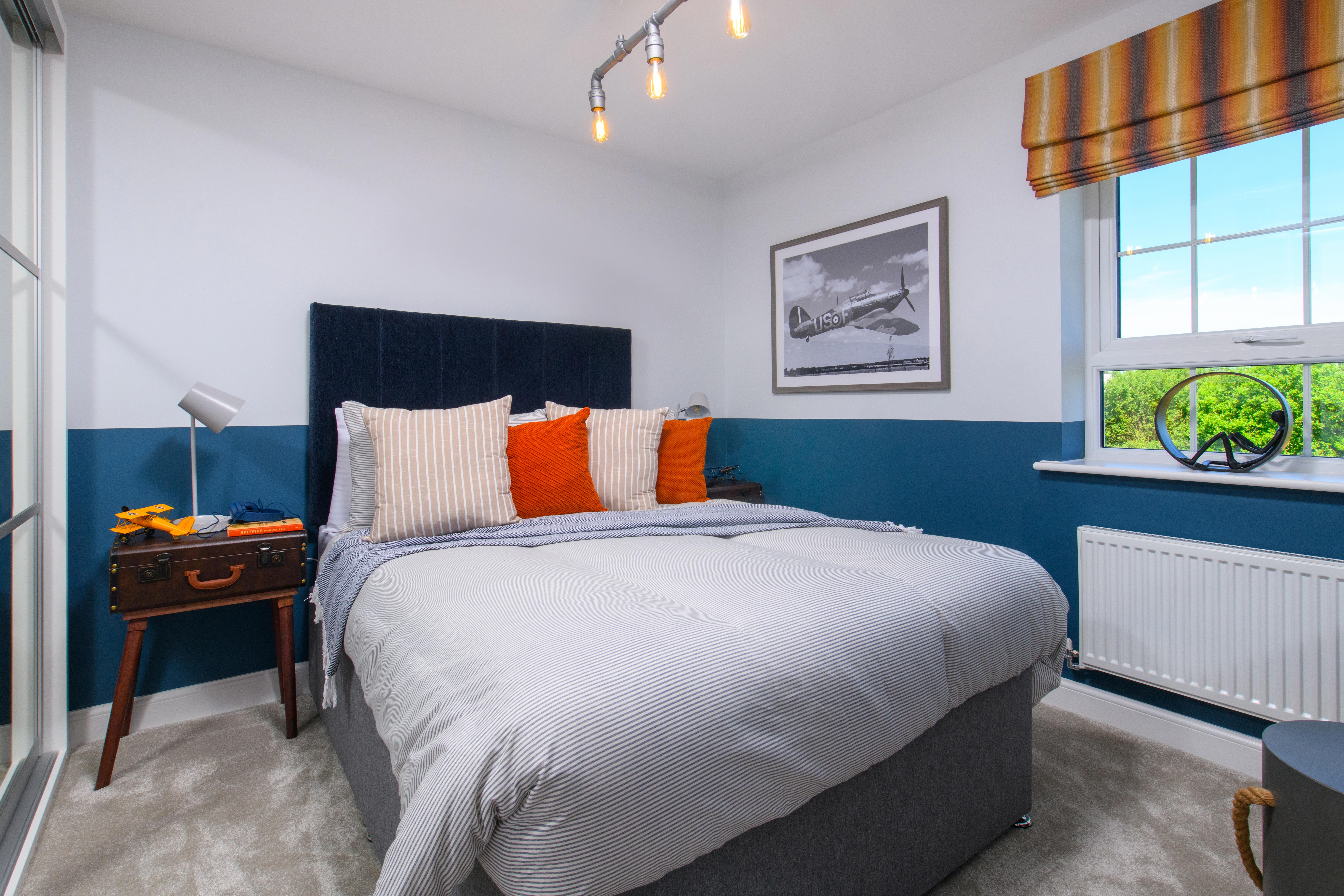 Double bedroom with built-in storage in Bradgate style home