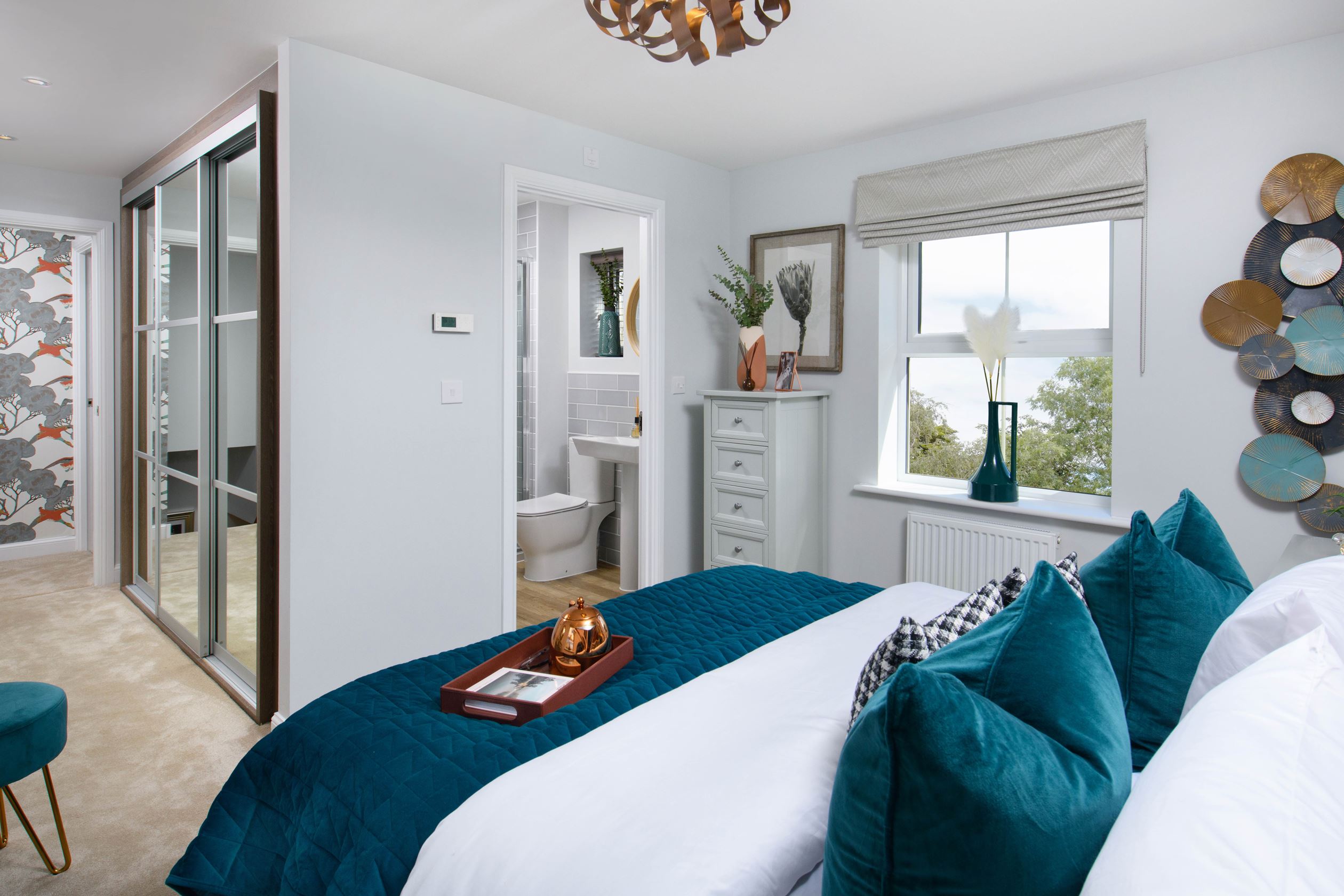 Main bedroom with built-in dressing area & en-suite in Avondale style home