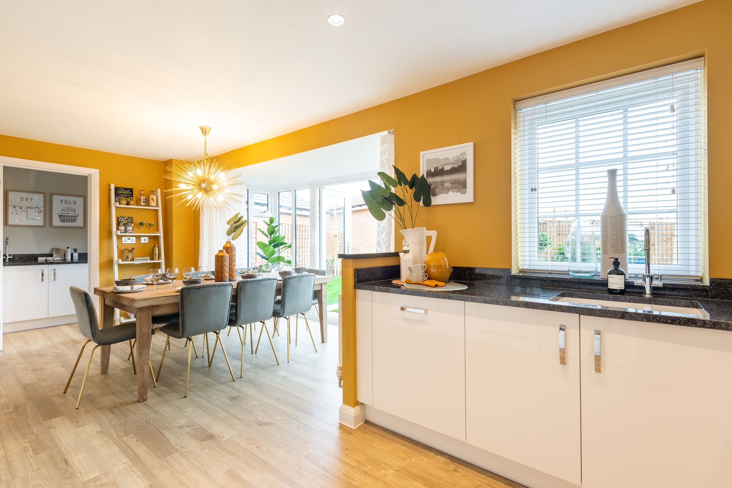 Holden open-plan kitchen with dining/family areas and French doors