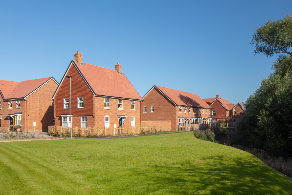 Outside view of the Beauworth 4 bedroom detached home overlooking green open space