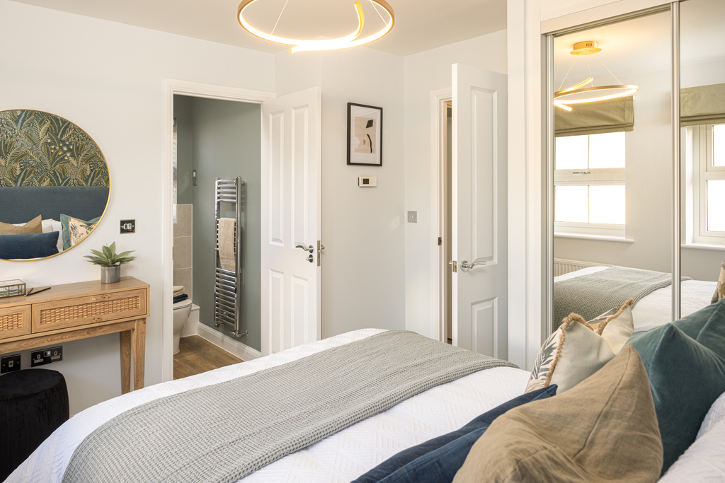 Internal image of the main bedroom and en suite in the archford at niveus walk