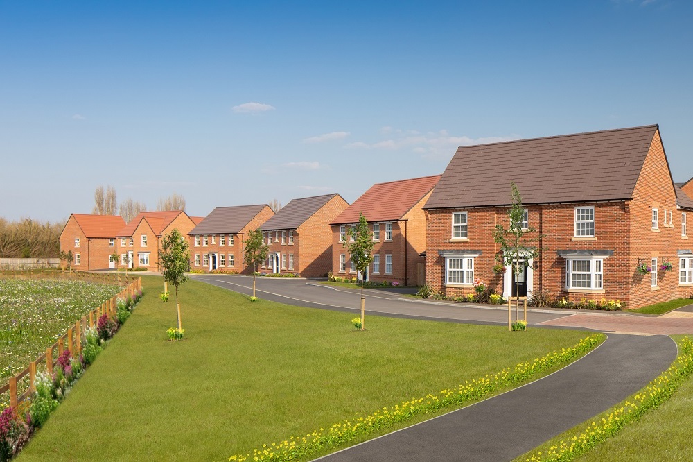Row of David Wilson houses with pedestrian-friendly street and path